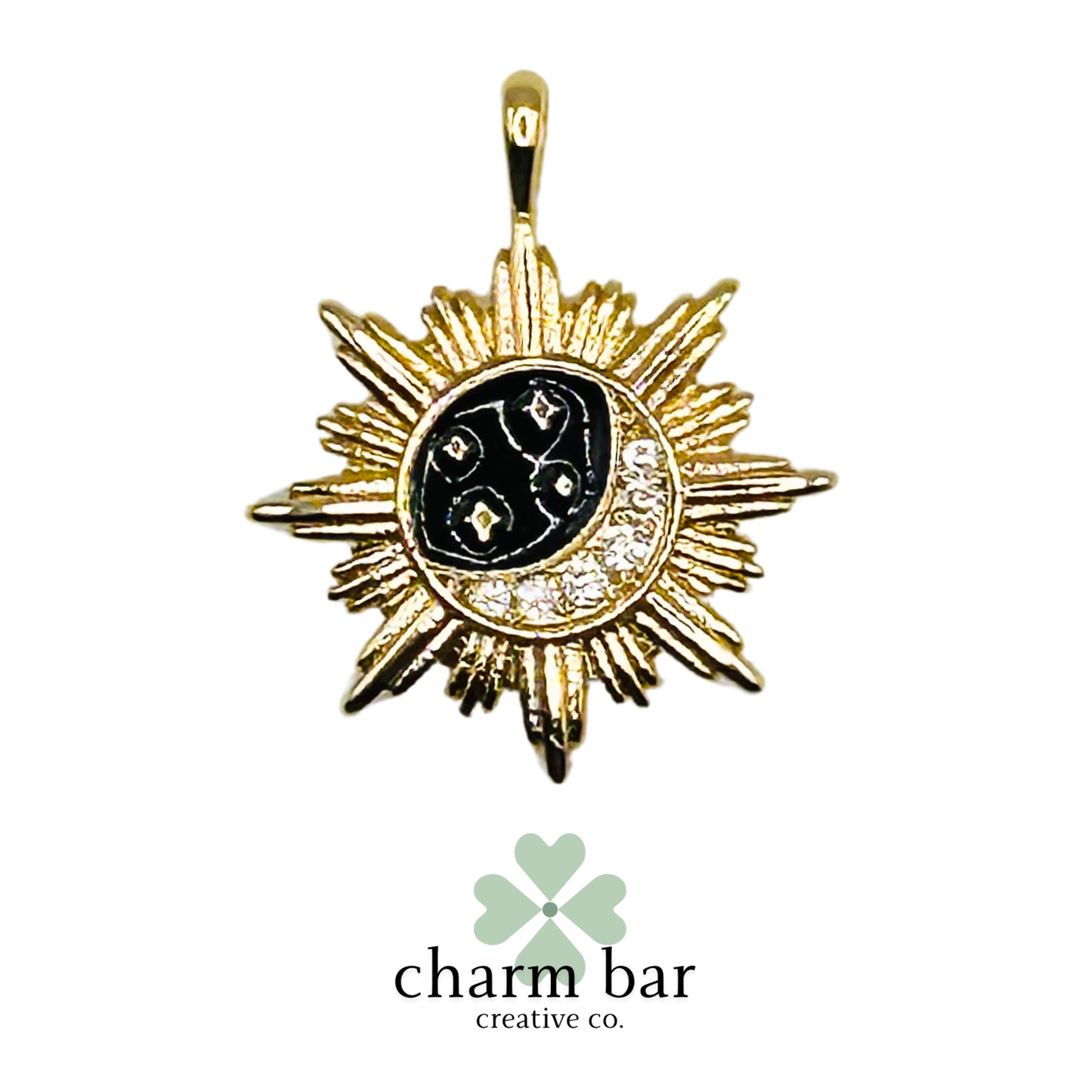 the Charms: Black and Gold Moon in Sunburst