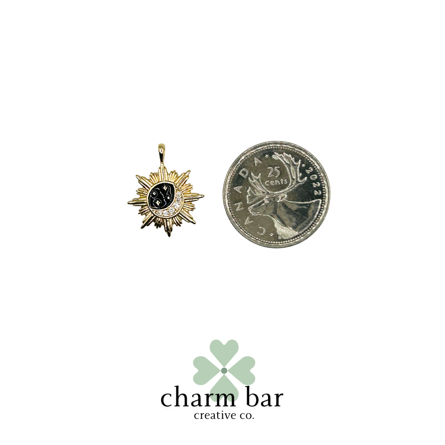 the Charms: Black and Gold Moon in Sunburst