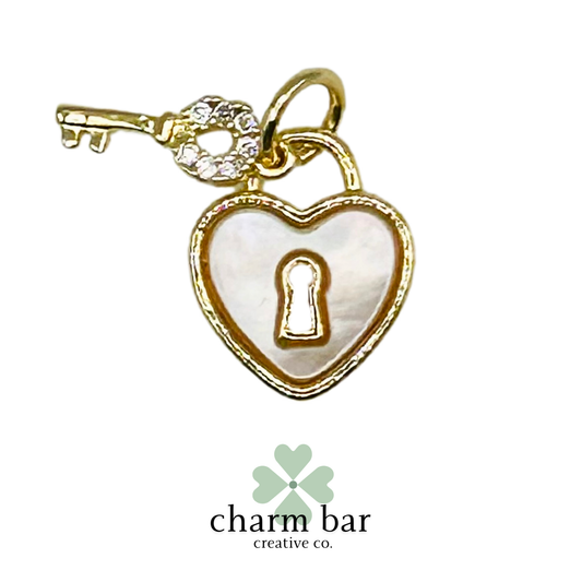 the Charms: Shell-Filled Heart Locket with Key